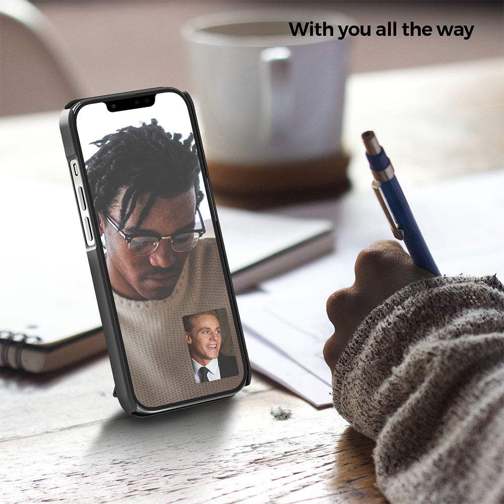 iPhone 14 Plus case with belt clip on desk, featuring durable design and kickstand.